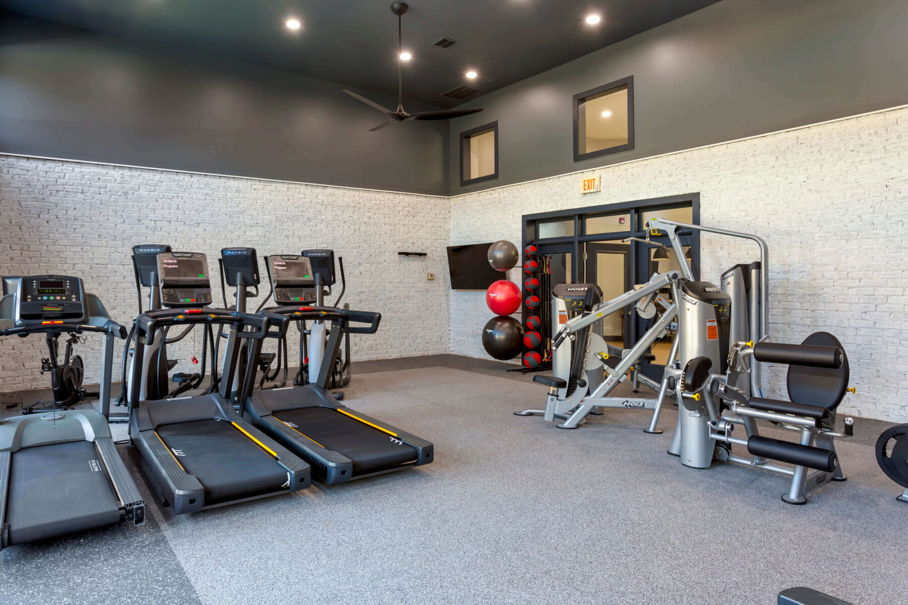 Fitness center with cardio and strength training machines